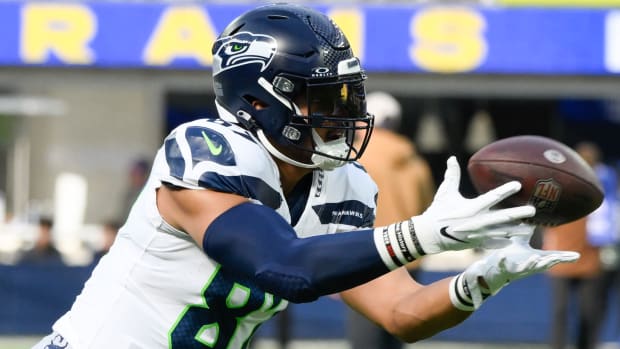 Nov 19, 2023; Inglewood, California, USA; Seattle Seahawks tight end Noah Fant (87) catches a pass during pre-game drills before an NFL game against the Los Angeles Rams at SoFi Stadium. Mandatory Credit: Robert Hanashiro-USA TODAY Sports